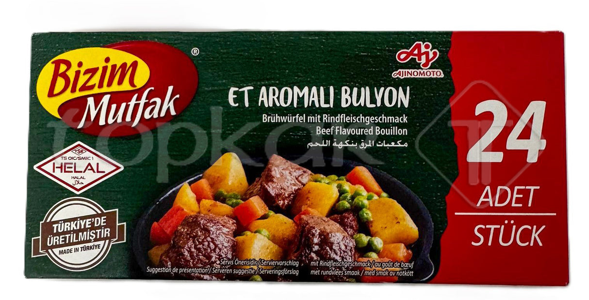 Bizim Rindergeschmack Brühwürfel 24 Stück Packung mit Rinderbrühe und Gemüse auf schwarzem Teller dargestellt